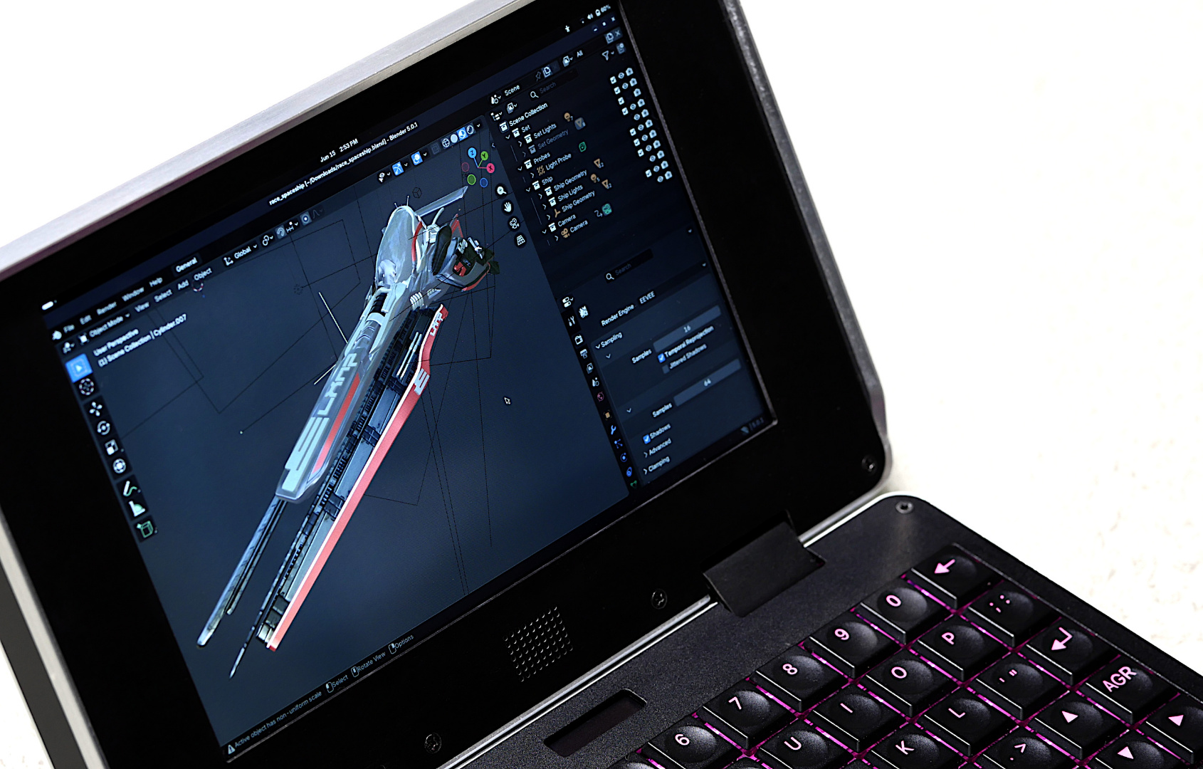 photo of MNT Pocket Reform with Blender open, running on Quasar